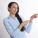 pointing, showing, woman-2649315.jpg